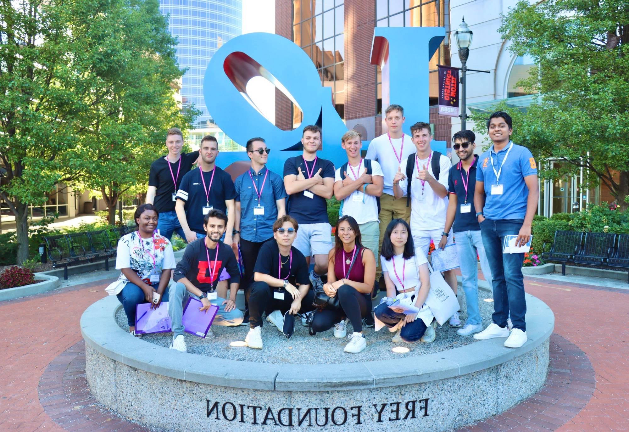 GVSU international students in downtown Grand Rapids in front of the LOVE sign sponsored by the Frey Foundation